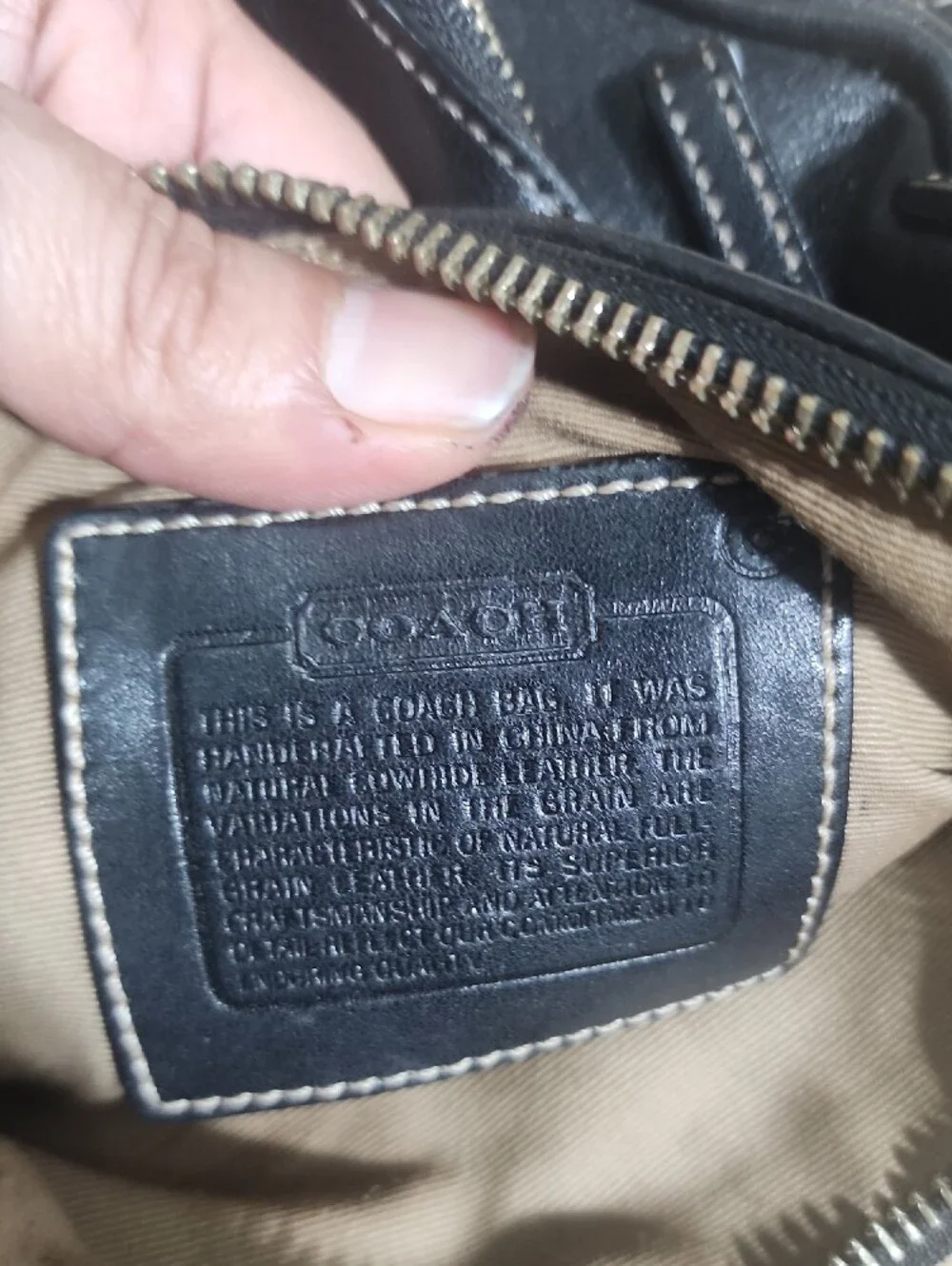 Coach sleek black