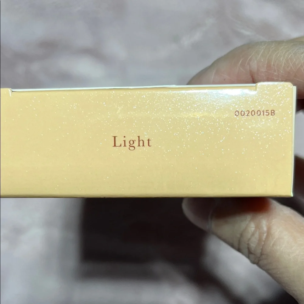 Laura Geller complexion cream gold