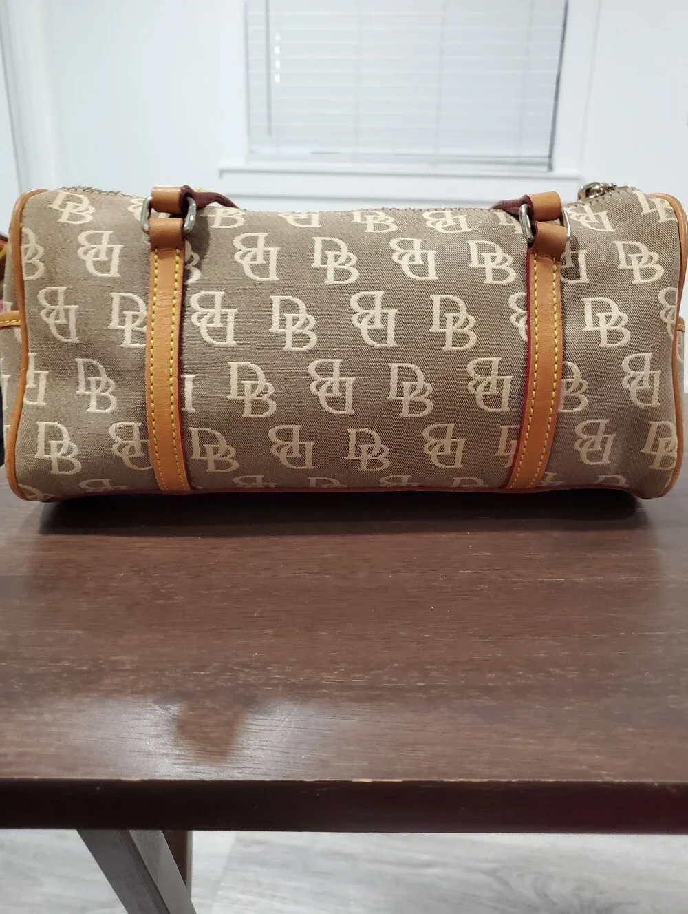 Dooney & Bourke flap trim