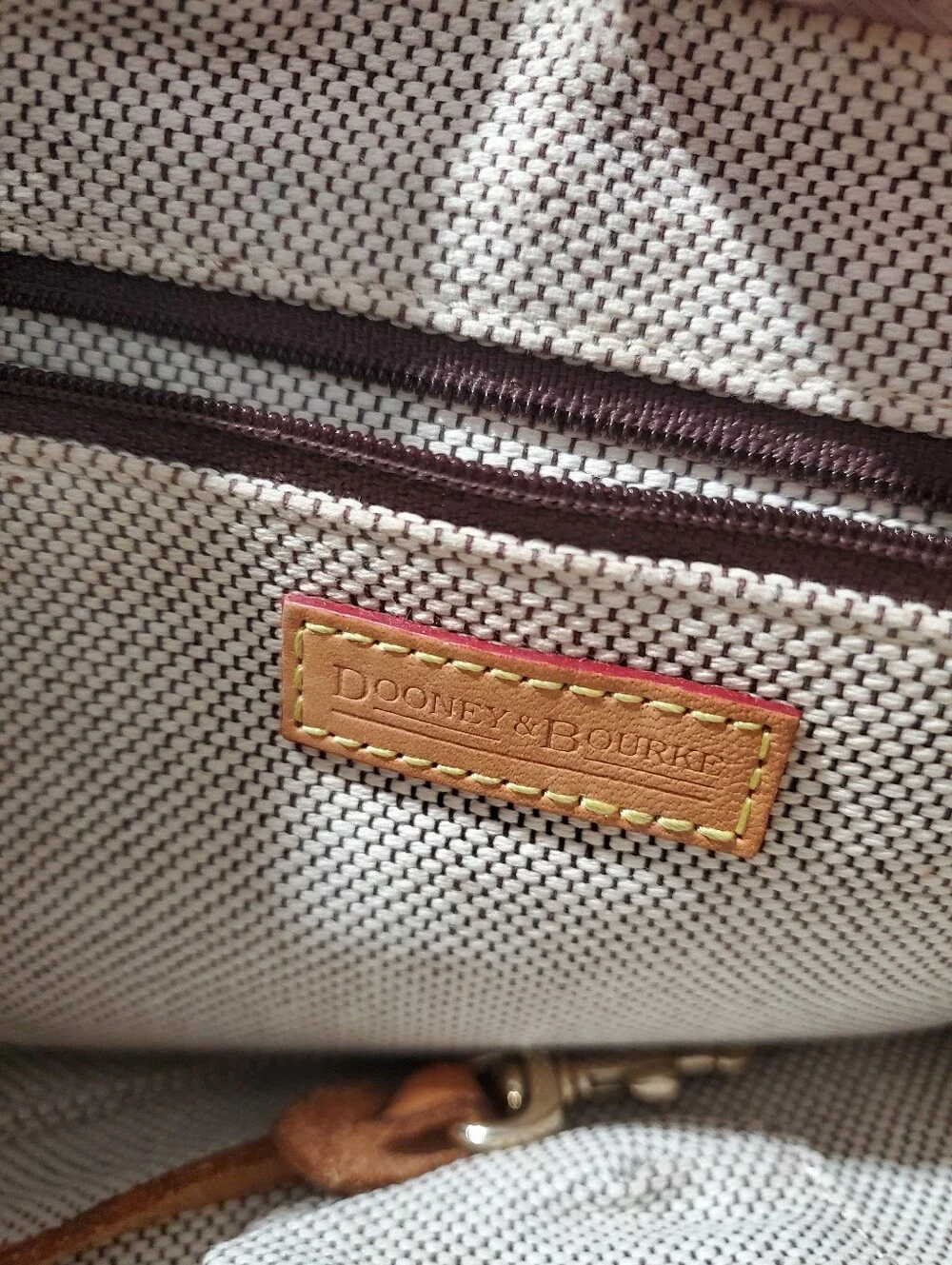 Dooney & Bourke logo travel