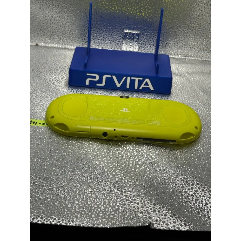 OEM ps vita 2000 yellow back shell w/touch pad - pre owned- authentic