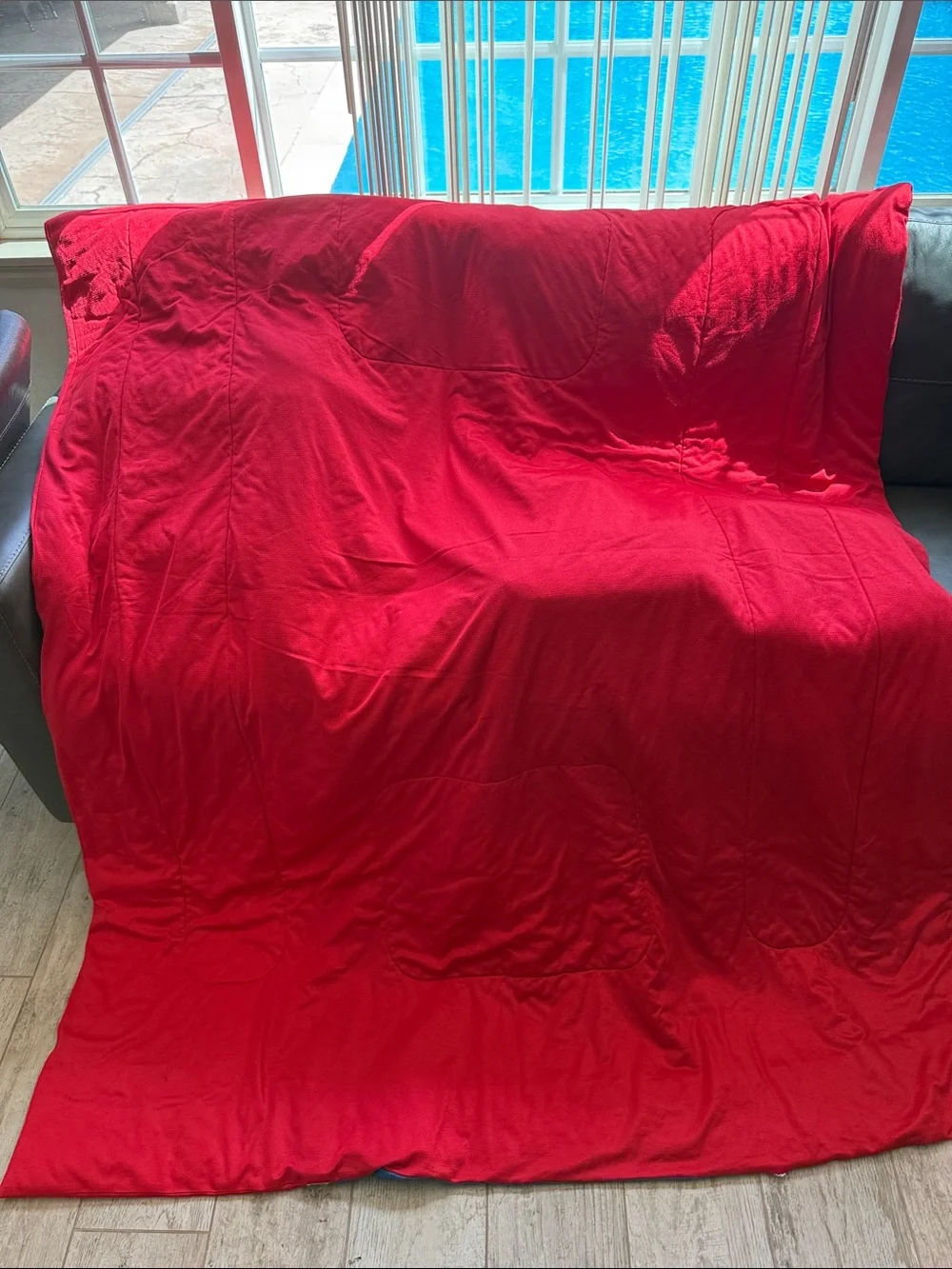 Genuine Merchandise quilted throw