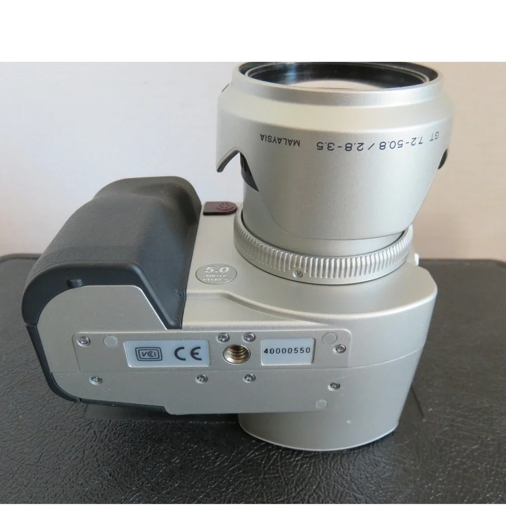 Minolta DiMAGE 7i 5.0MP Digital Camera Kit with 7x Zoom Lens Hard Case Charger