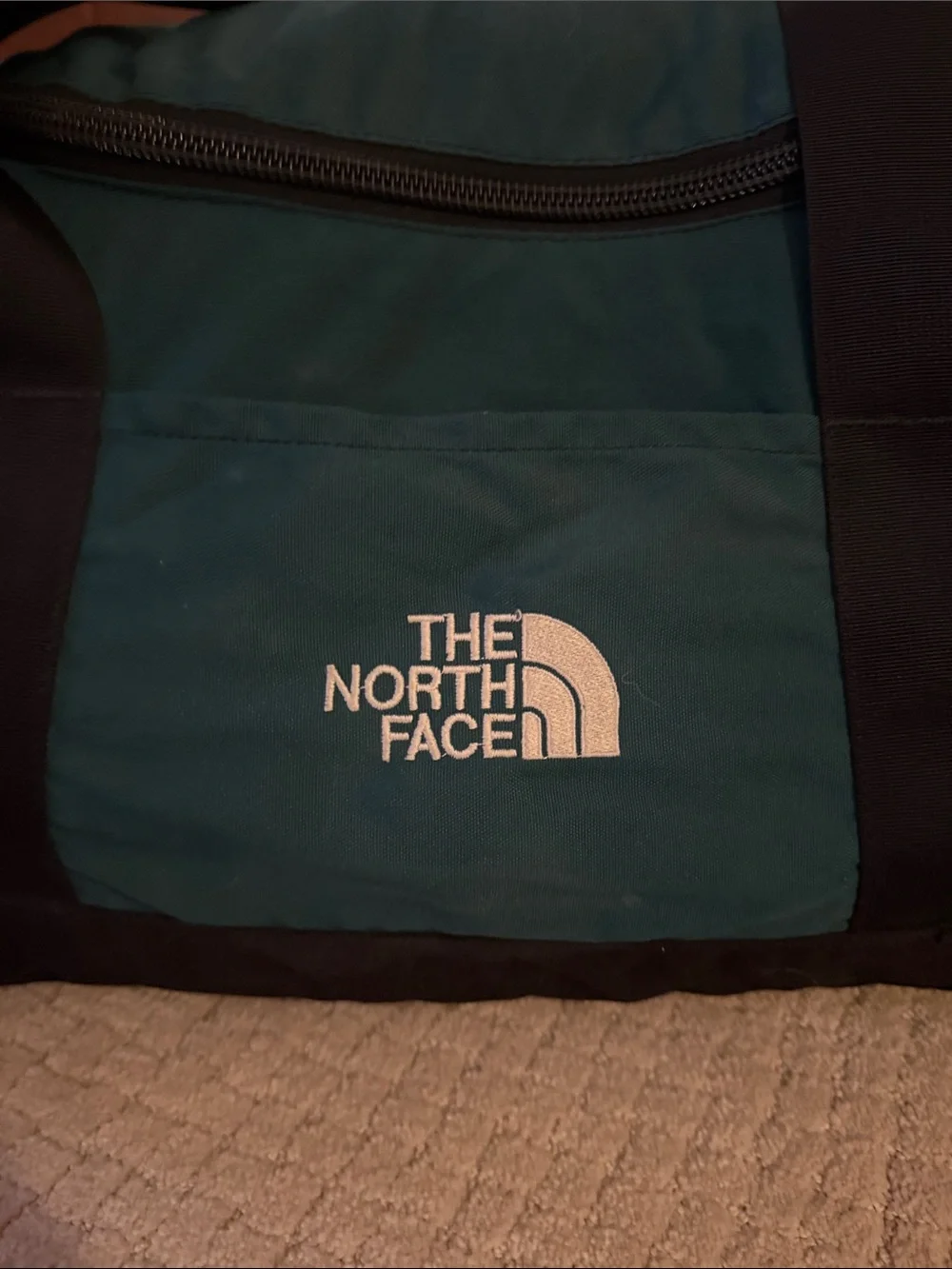 The North Face Green and Black Duffel Bag