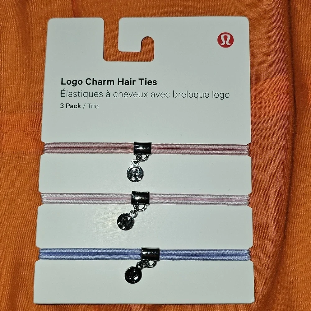 Lululemon Logo Charm Hair Ties!! 3 Pack! Nwts! PKHZ/PNKO/LFRS!!