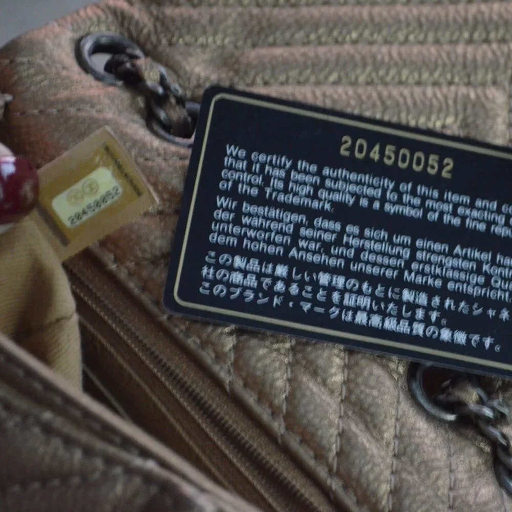 CHANEL bronze leather