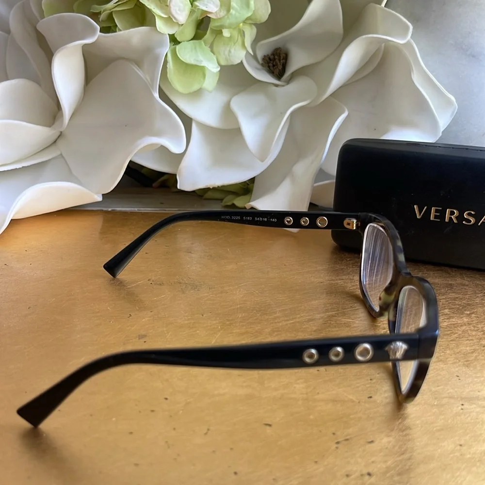 Versace lightly worn