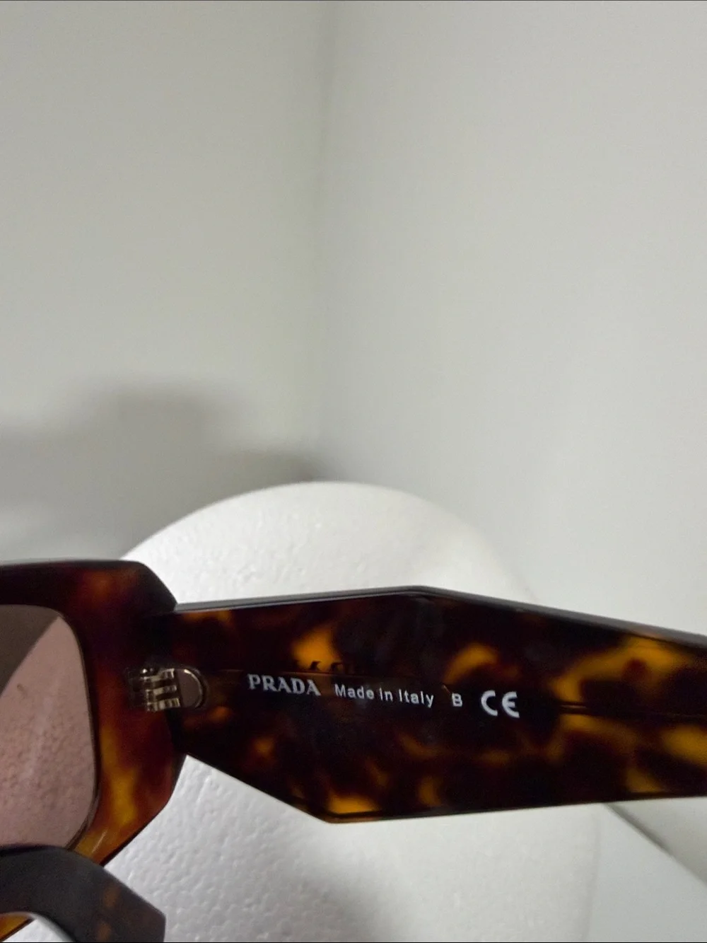 Prada brown acetate case