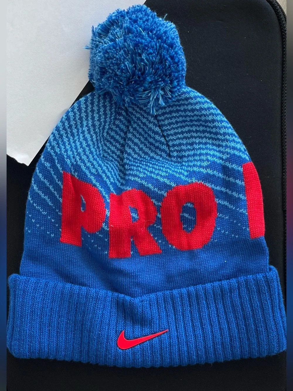 Nike Kids Blue Knit Pom Beanie with Red 'Pro Level’