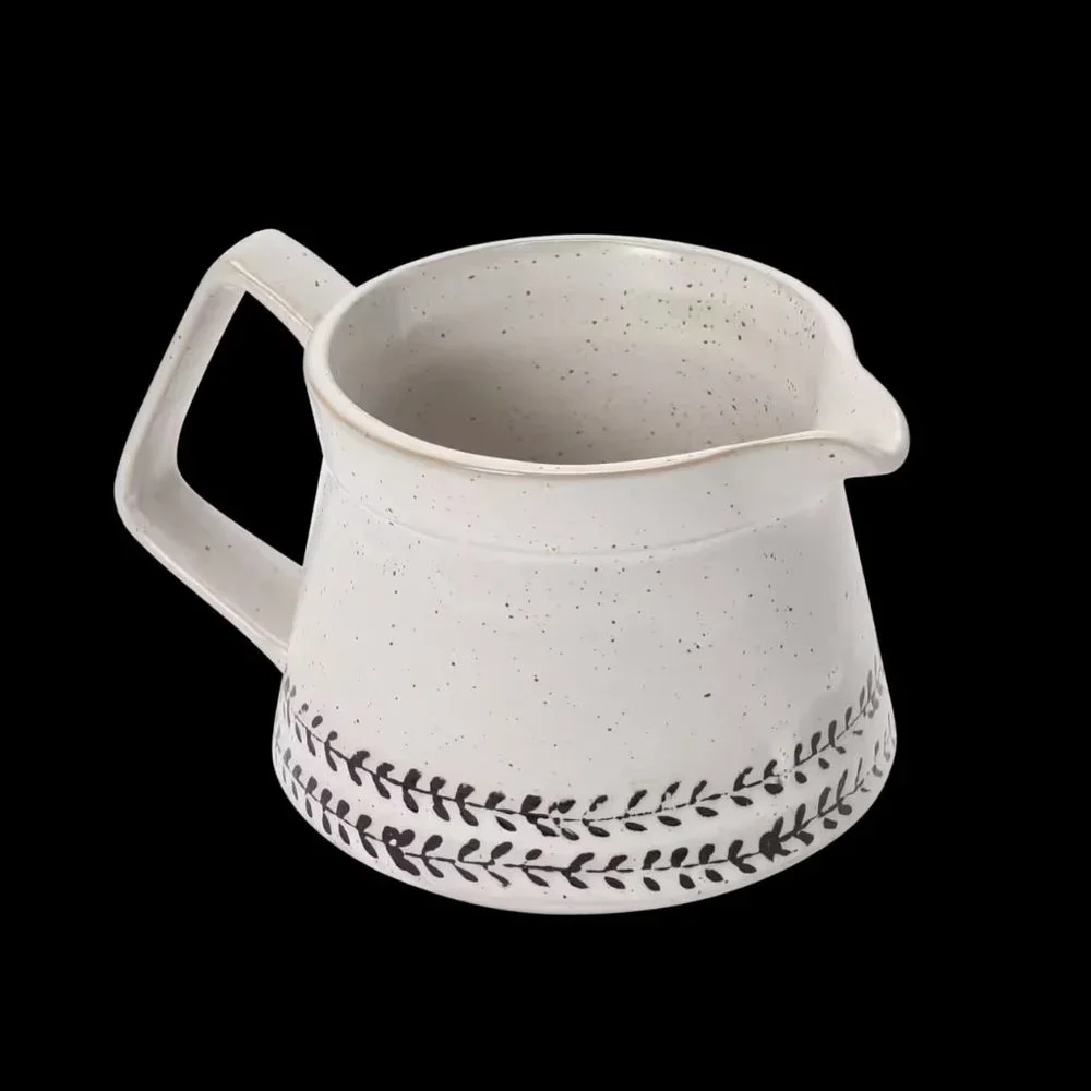 Creative Co-Op White & Black Debossed Pattern Reactive Glaze Stoneware Creamer