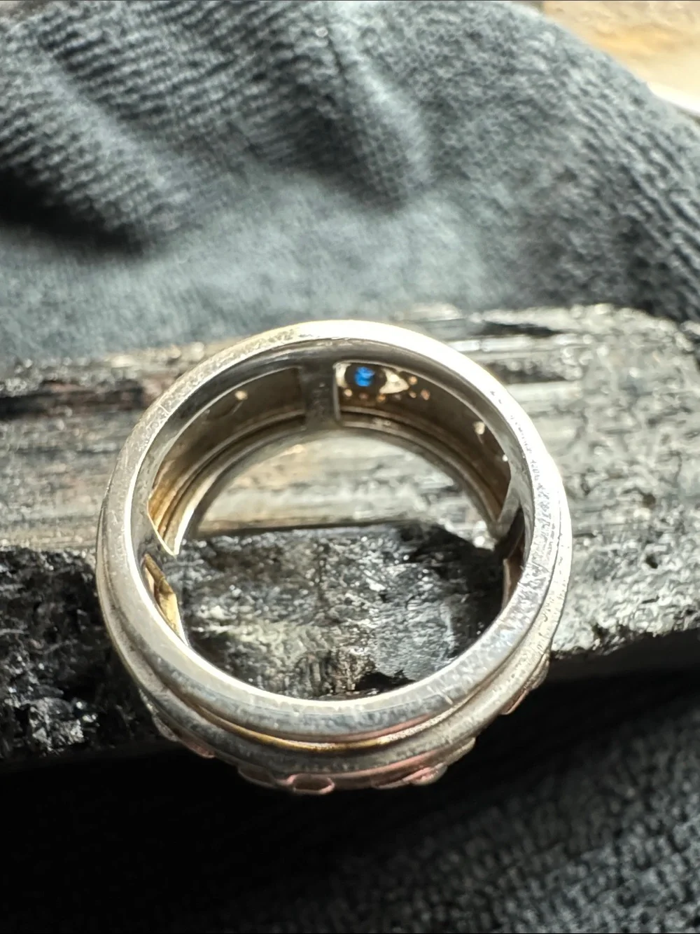 Silver Spinner Band Ring with Blue Stone Evil Eye Accent