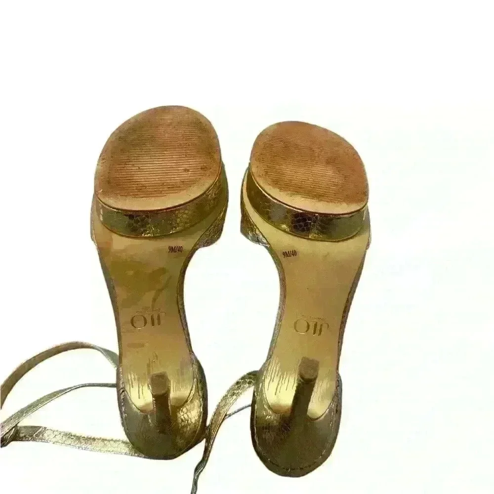 JLO Gold platform pumps