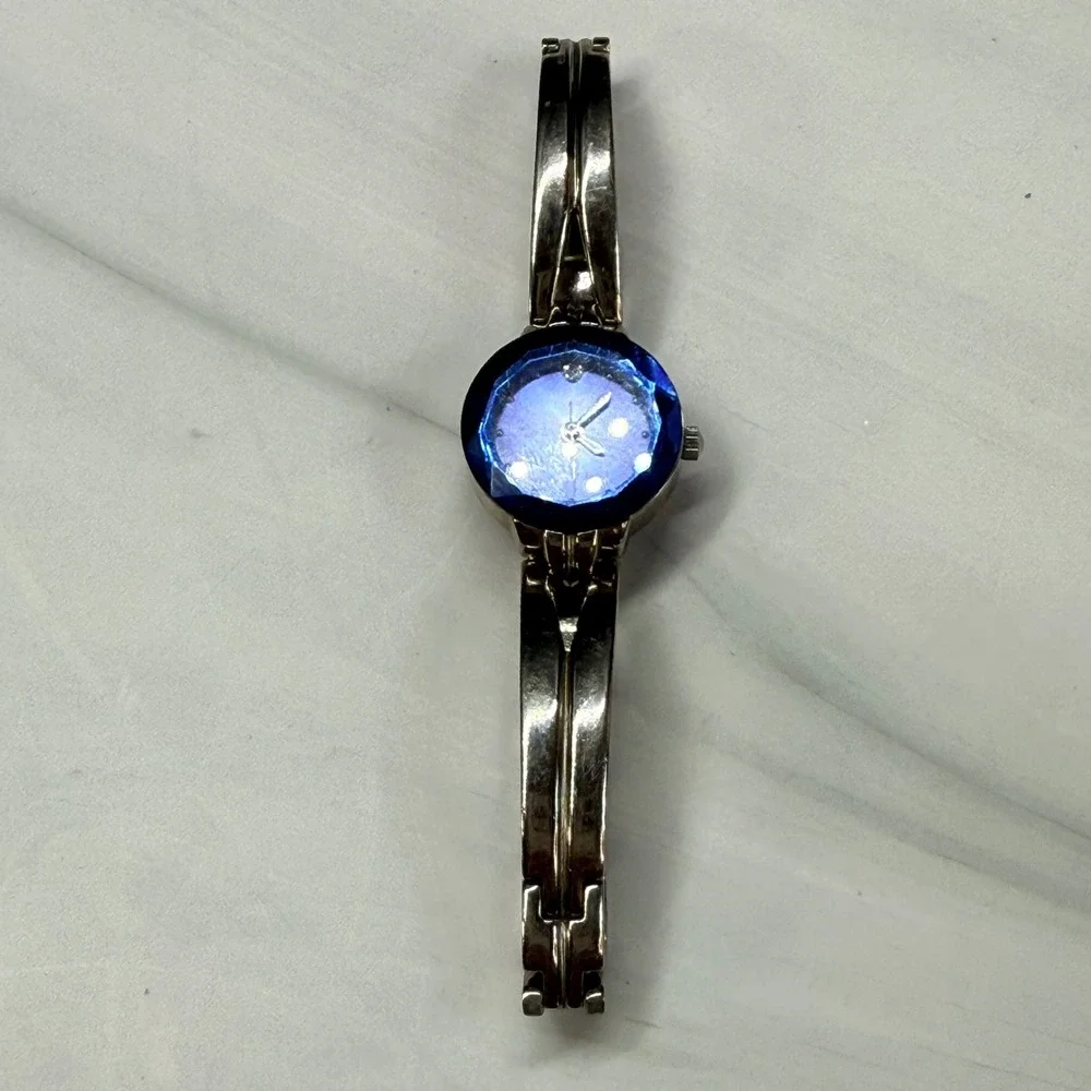Armitron Diamond Now Womens Silver Tone Bangle Watch Blue Faceted Dial 75/2967