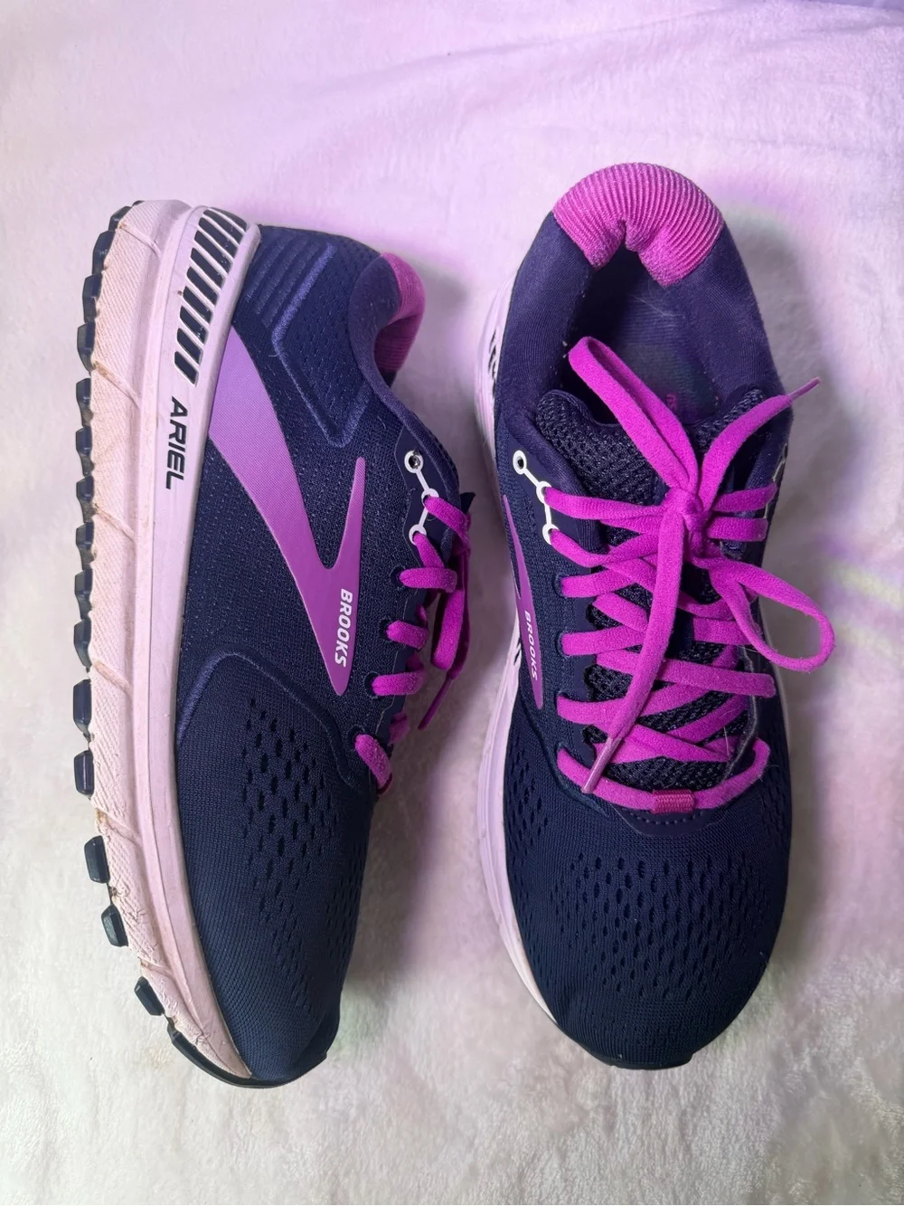 Brooks accents support navy