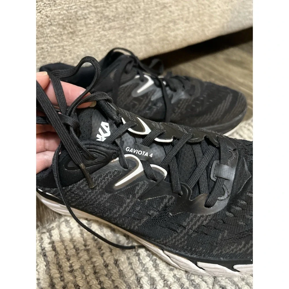 Hoka One One black wide feature