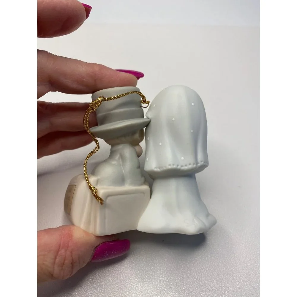 Precious Moments figurine this together