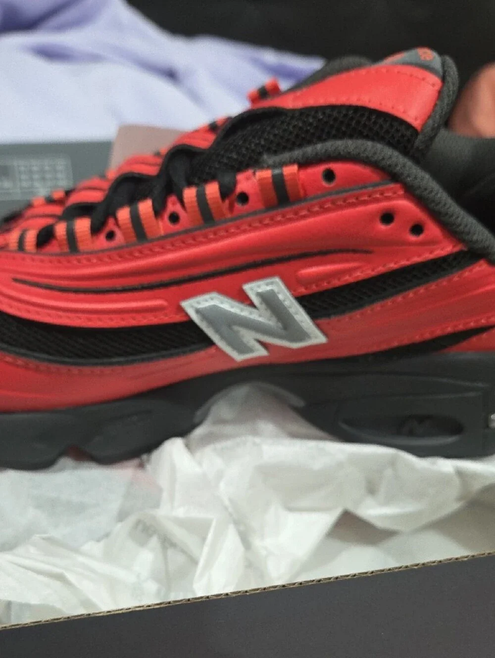 New Balance striking red