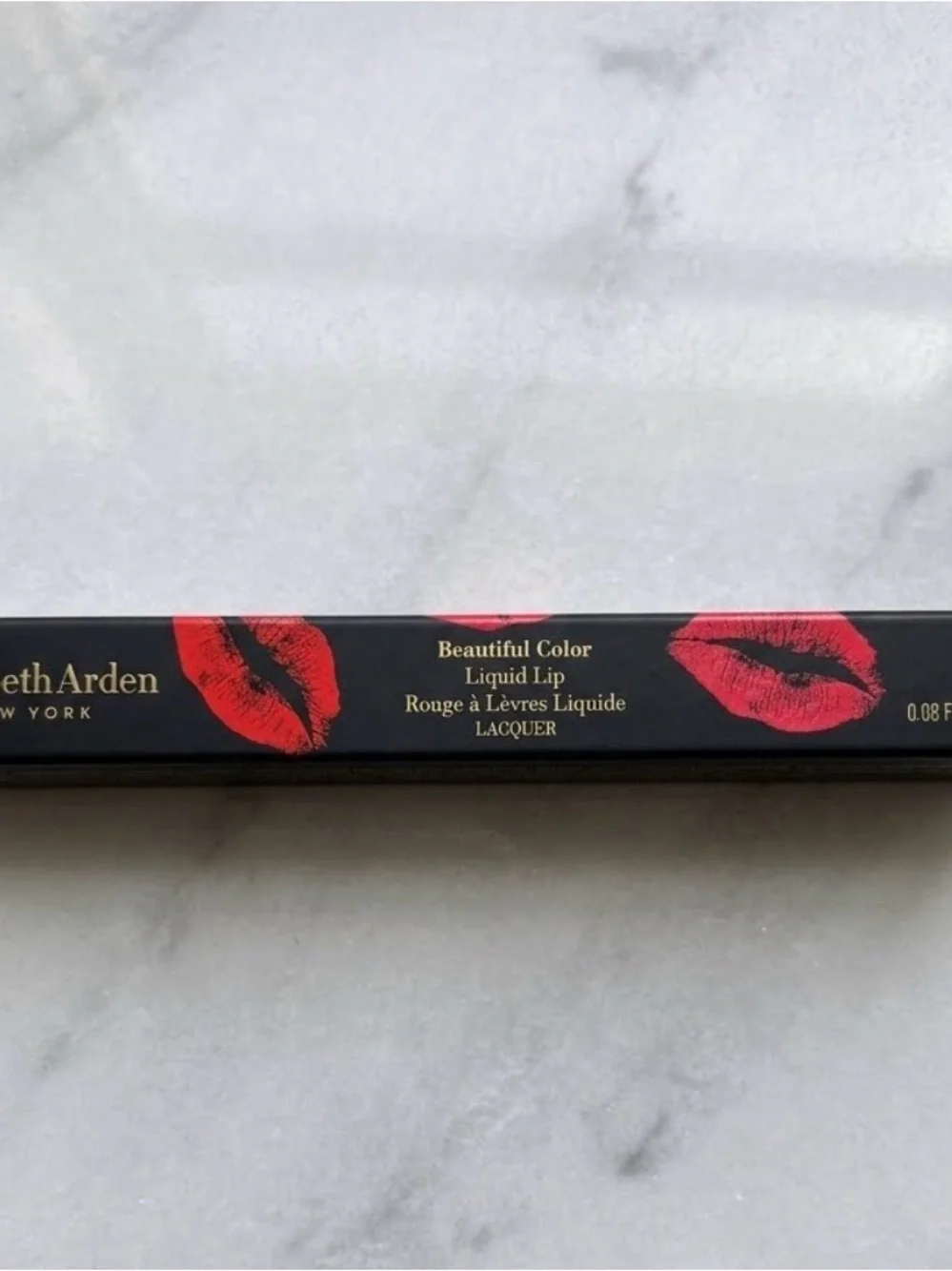 Elizabeth Arden Beautiful Color Liquid Lip Lacquer; color: coral infused