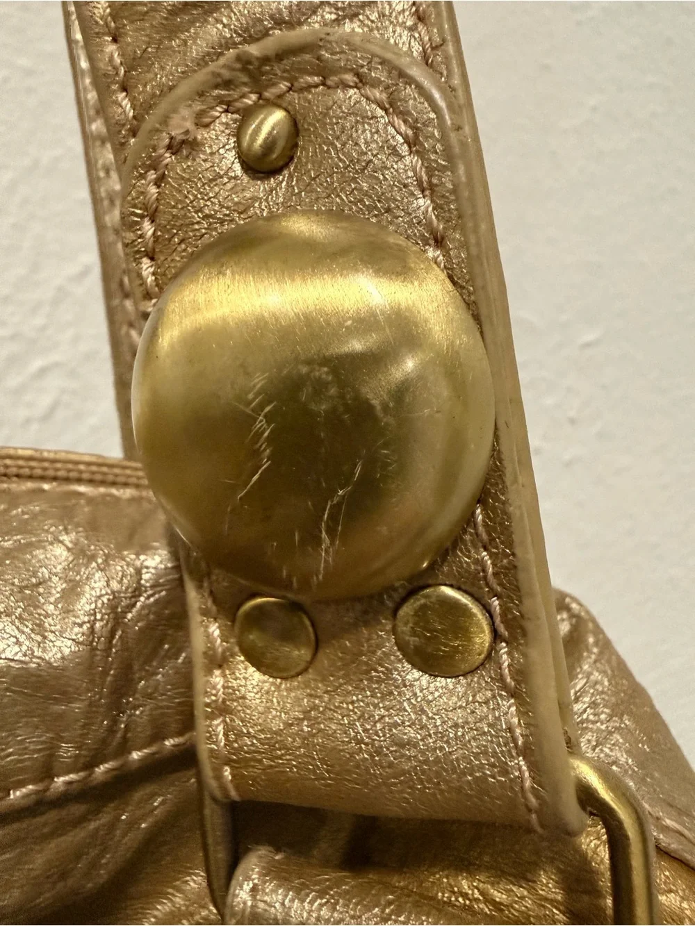 Big Buddha scratches bag