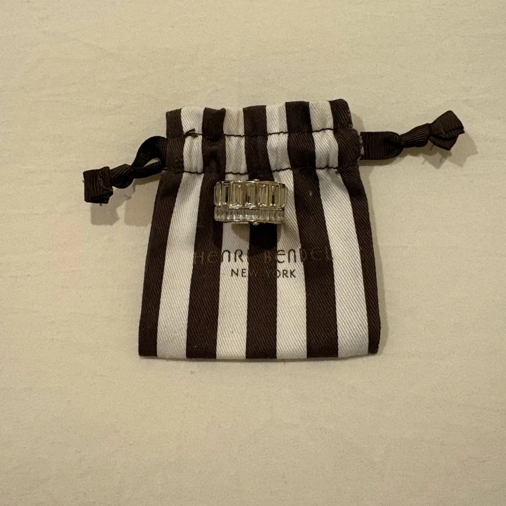 Henri Bendel Clear Stone and gold tone ring with Designer Pouch.