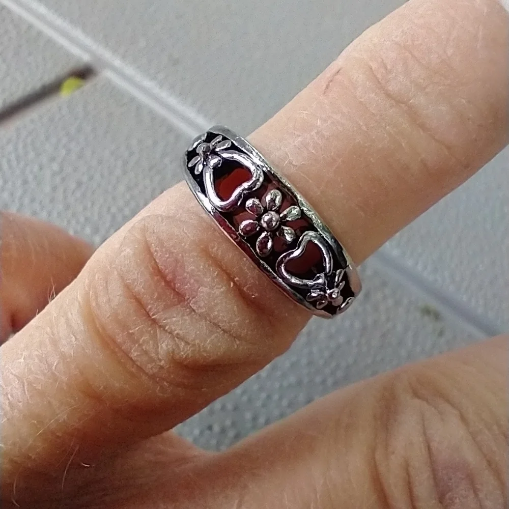 Women's marked S floral ring.