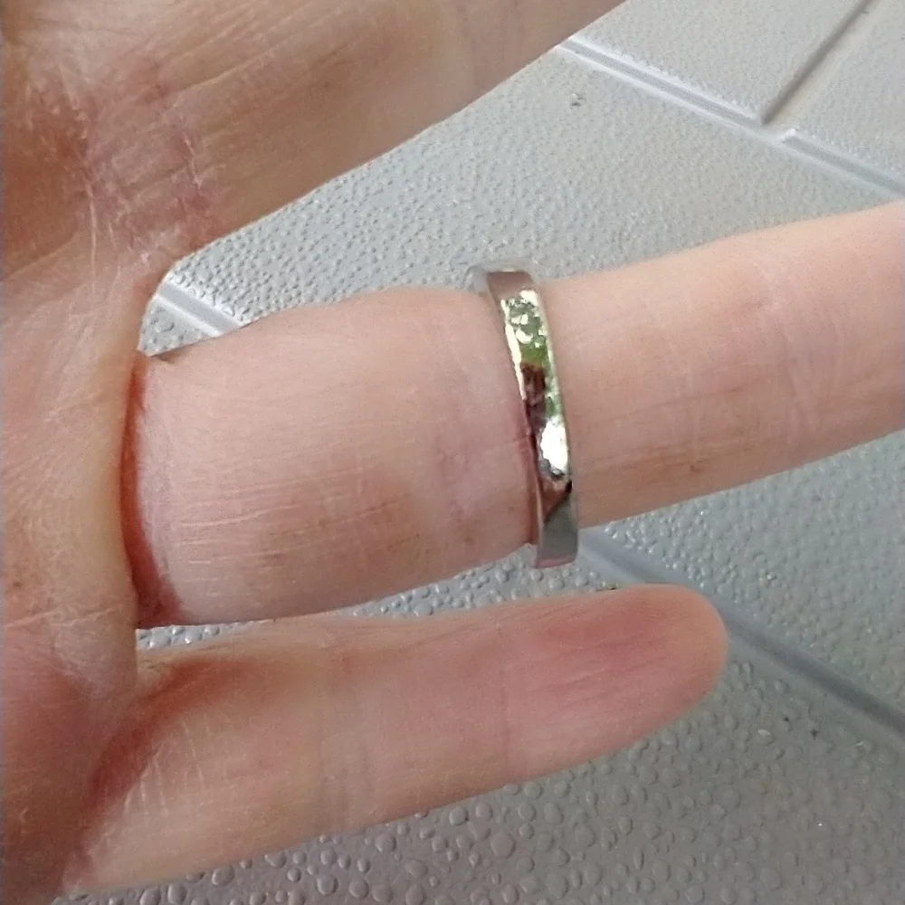 Women's marked S floral ring.