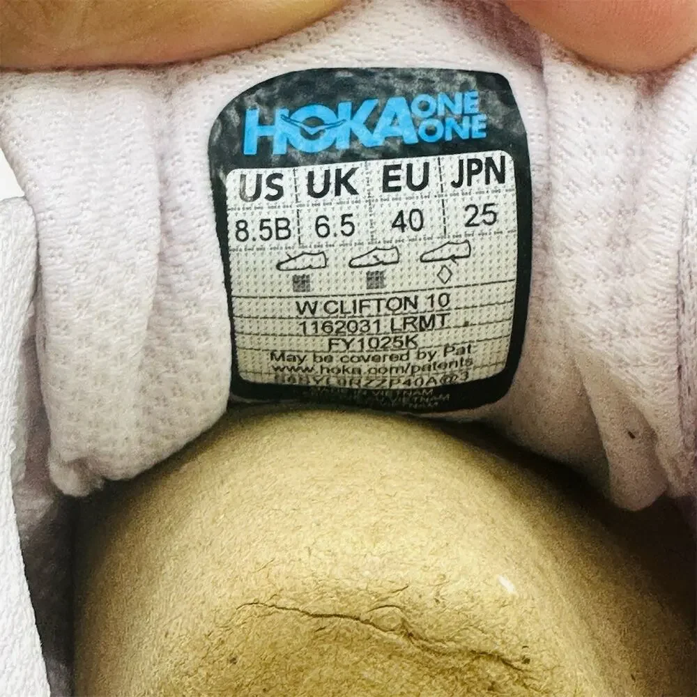 Hoka One One cushioned cream