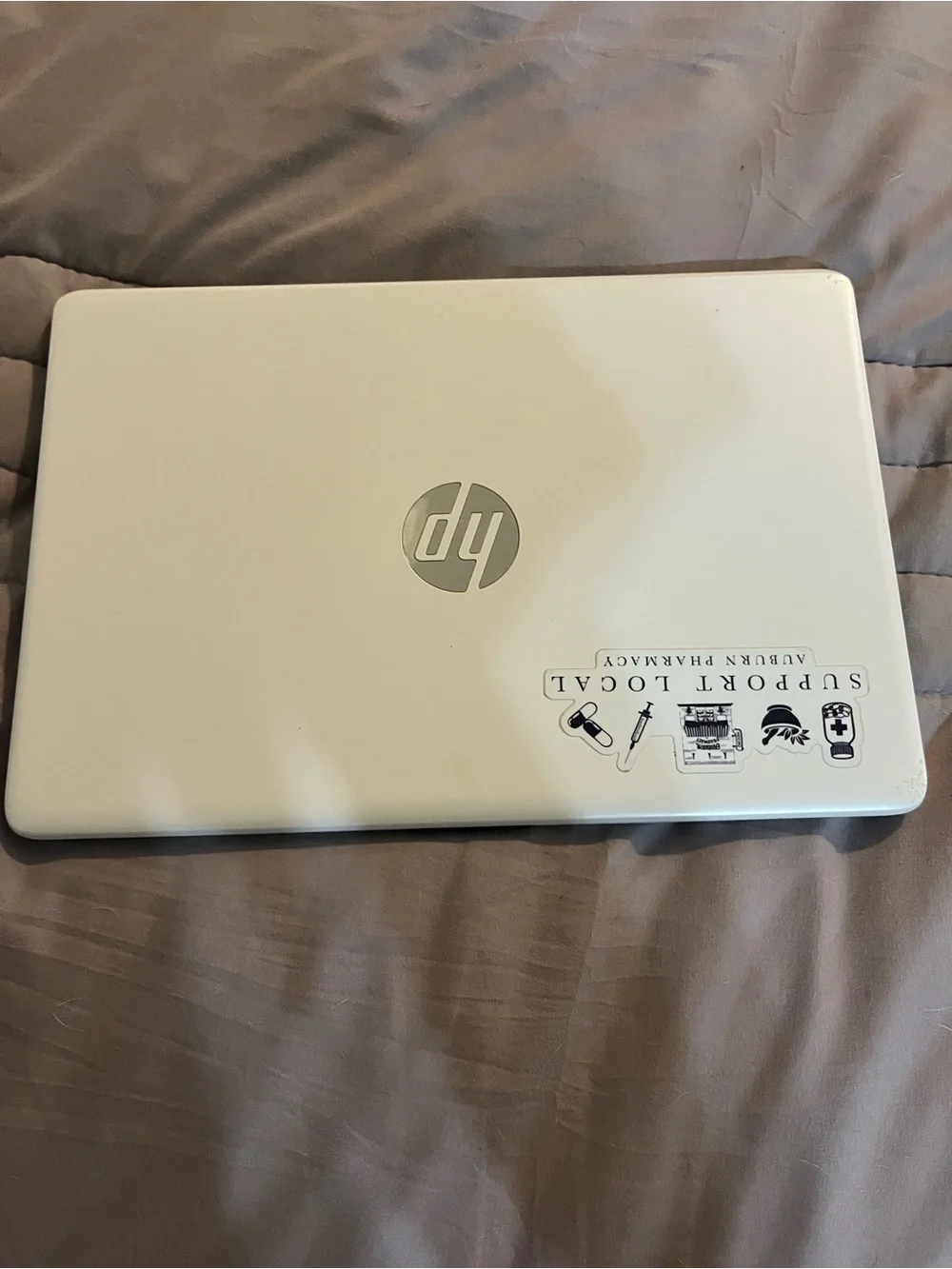 HP White Laptop with Silver Logo