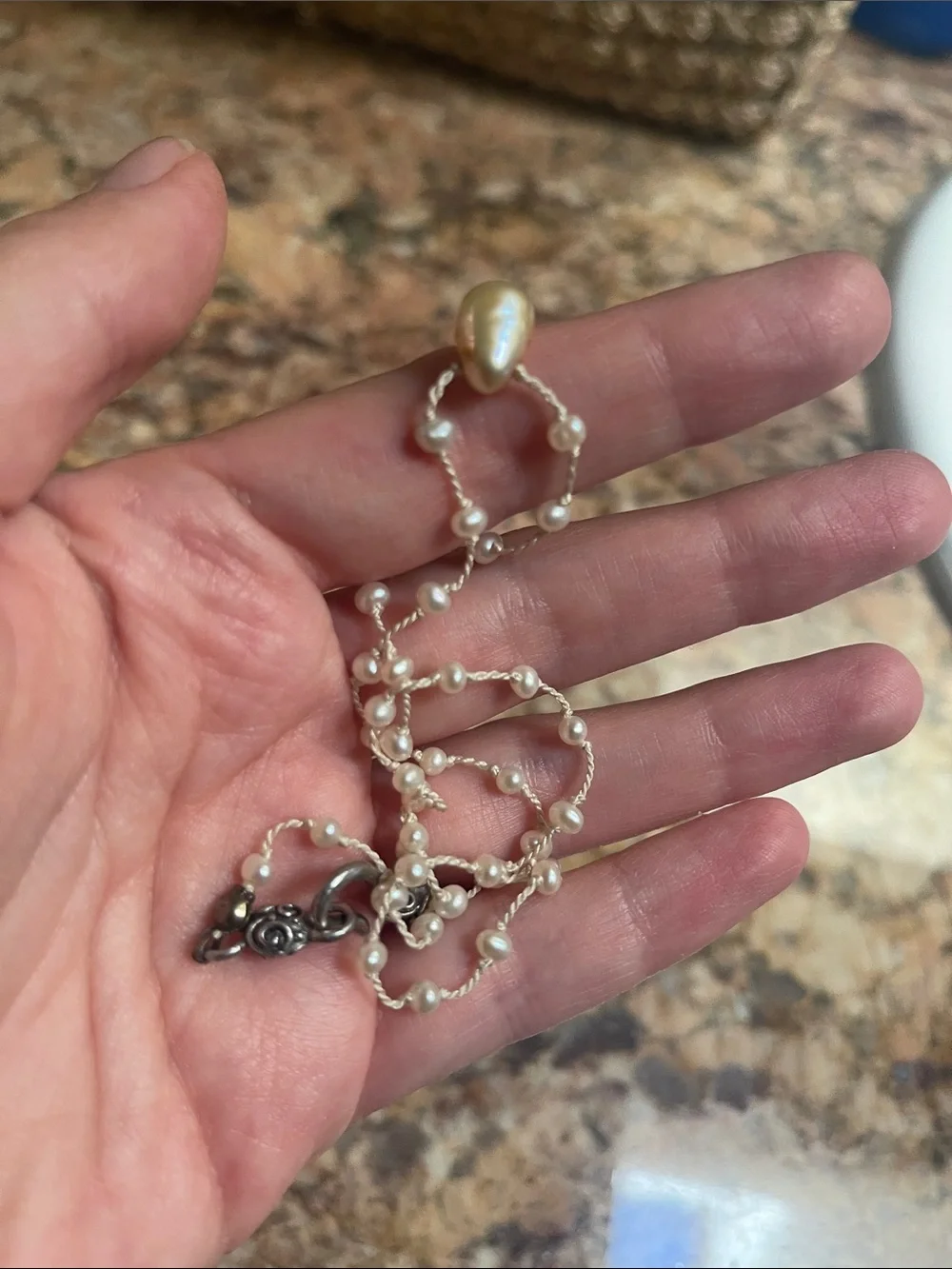 Vintage pearl necklace with baroque pearl center
