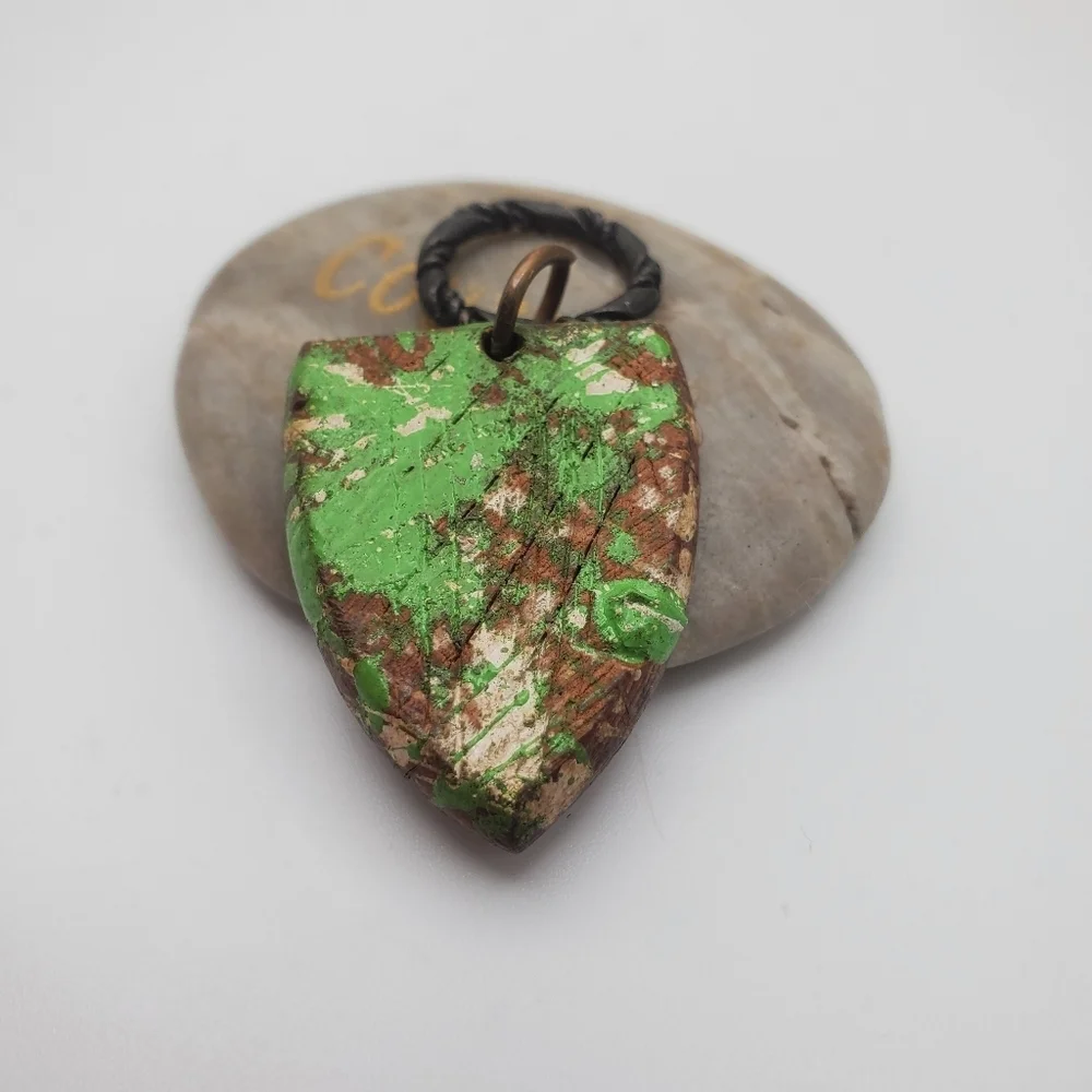 Nature's earthen‎ stem shield necklace pendant