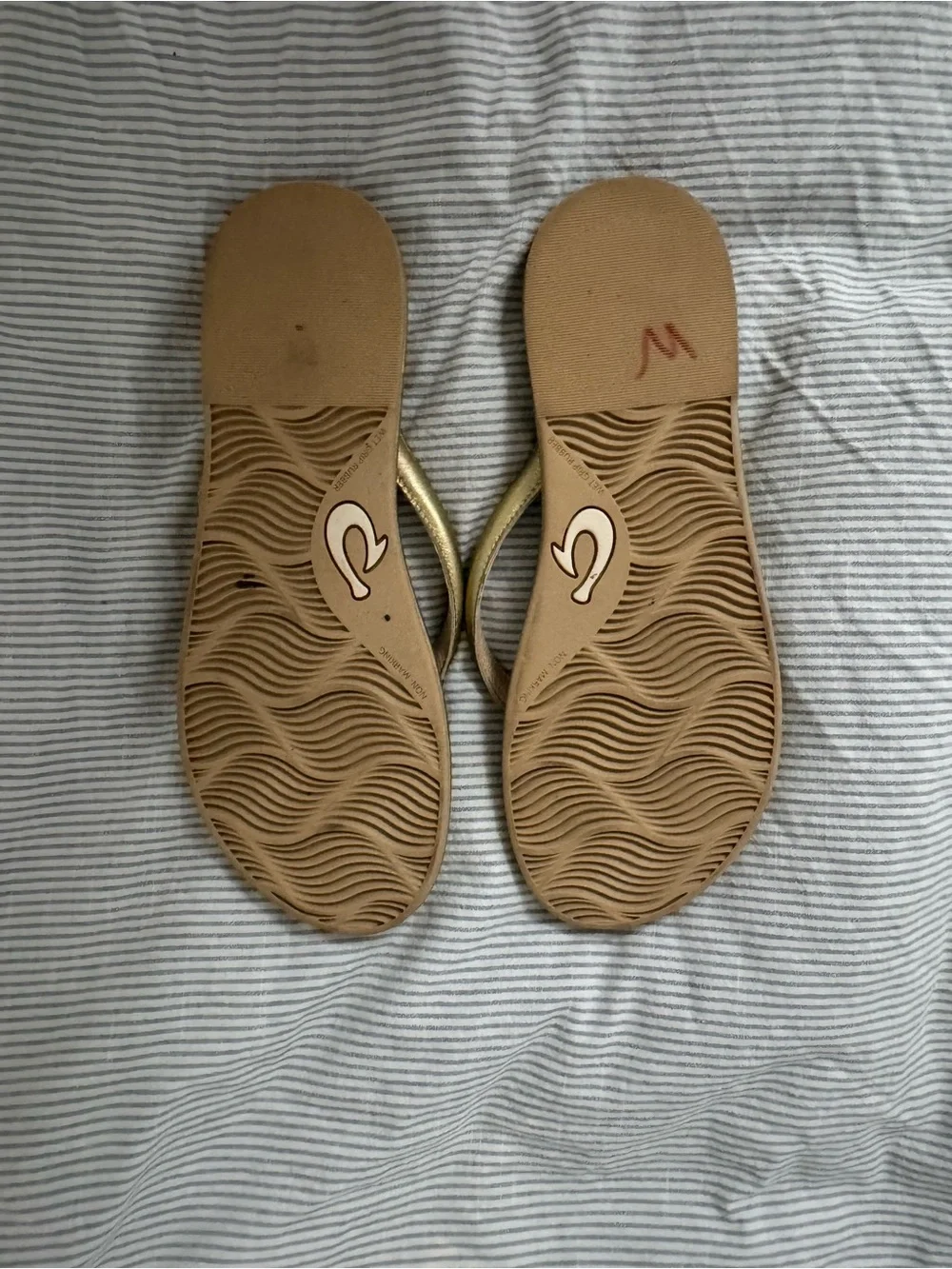 OluKai sleek metallic