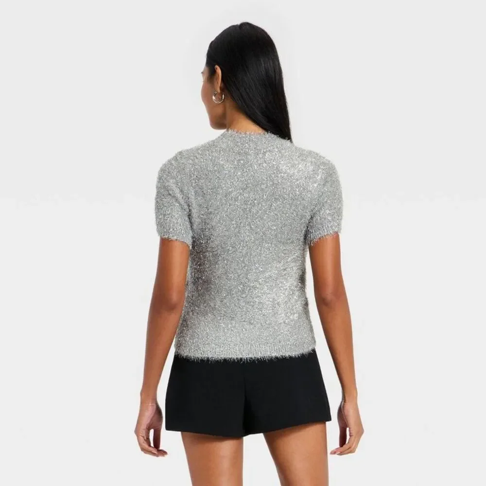 a new day tinsel sweater