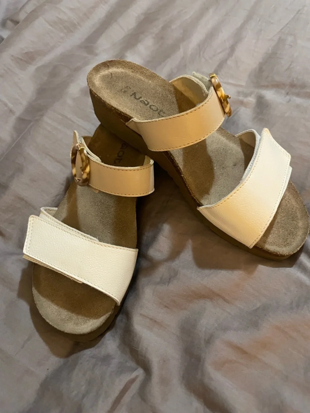 Naot White Slide Sandals with Gold-Tone Decorative Ring