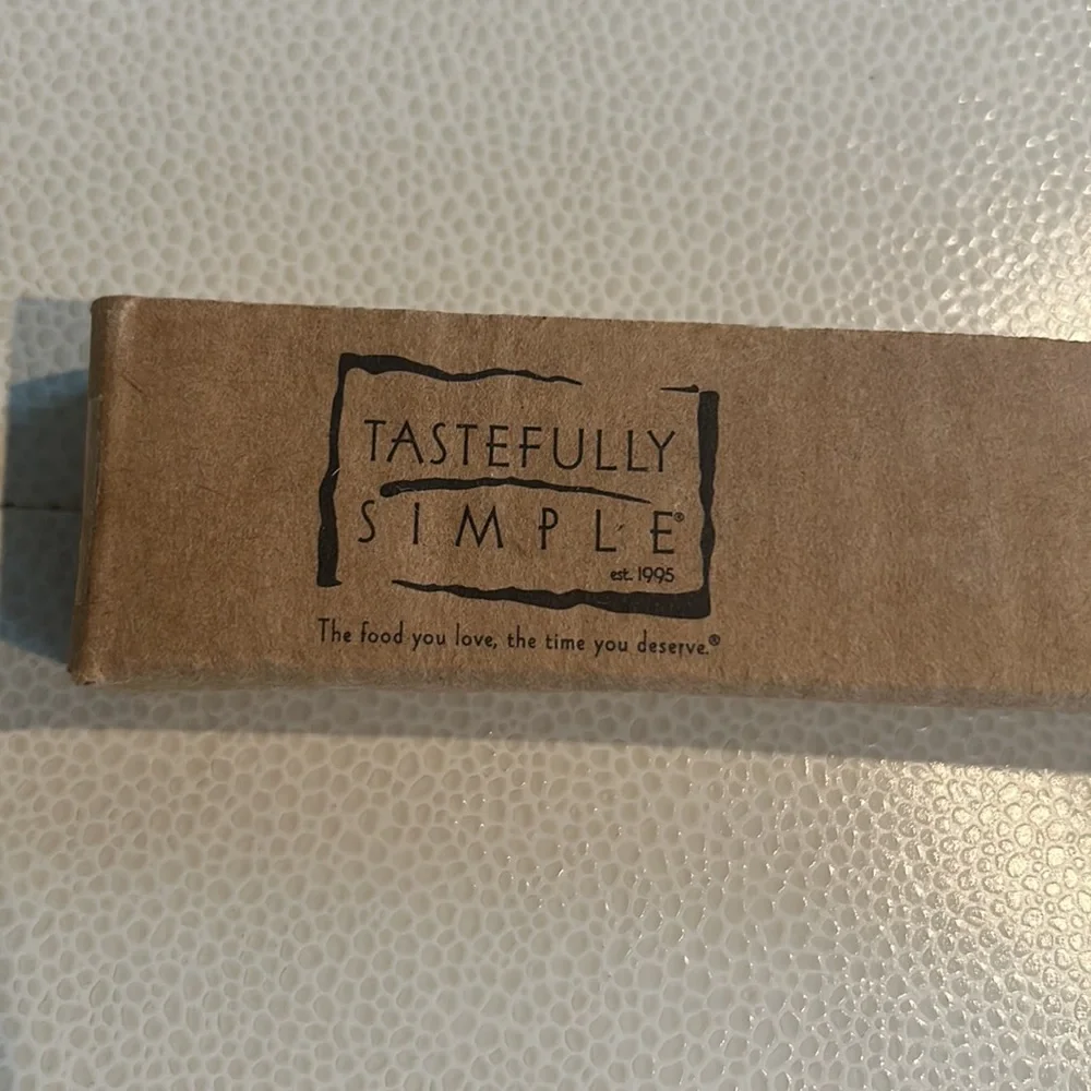 Tastefully Simple new never