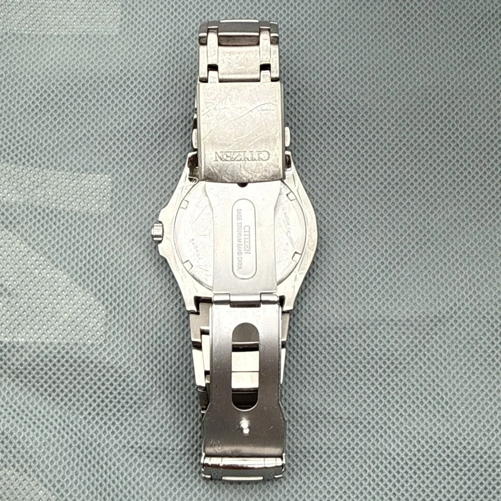 Citizen Eco-Drive Titanium E111 Solar Men's Japan Watch New Orig Battery Cell