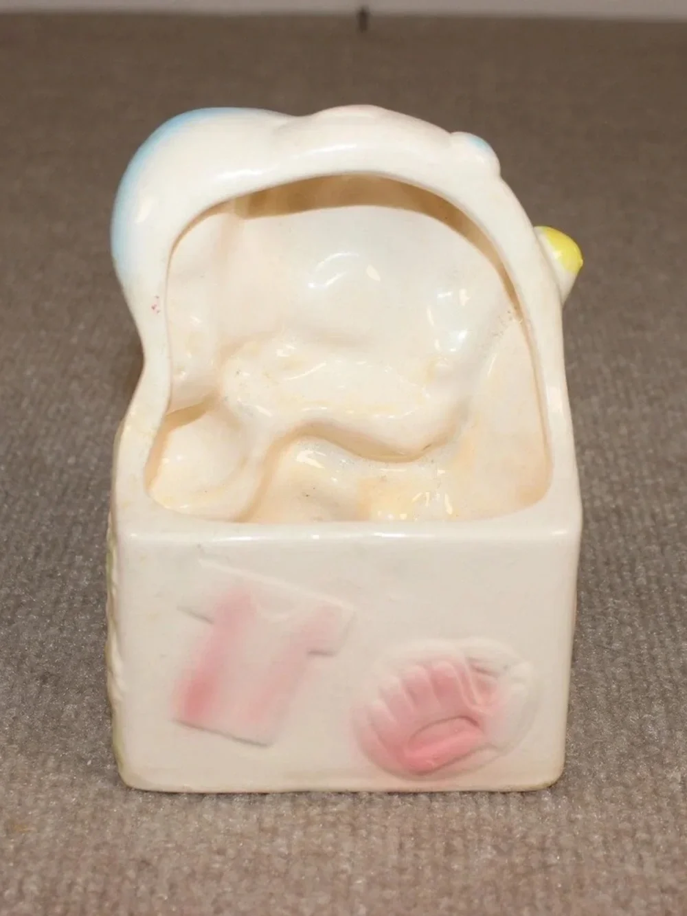 Vintage Ceramic Baby Figurine with Pastel Blue and Yellow Accents