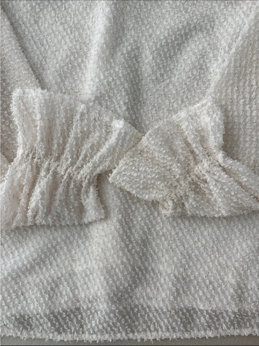 LOFT knit flaws noted