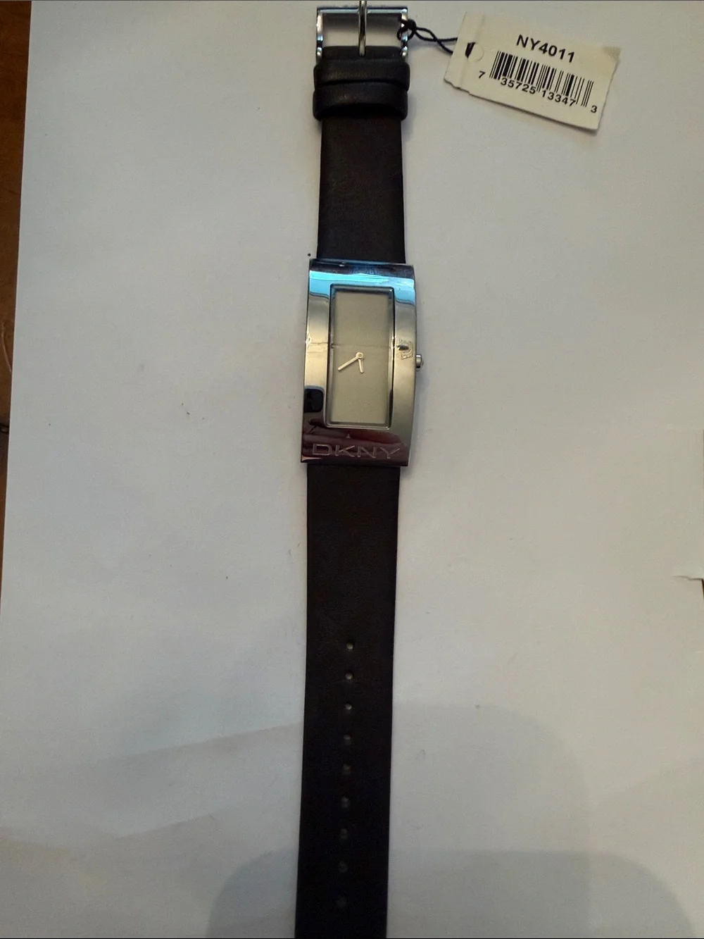 DKNY Silver Rectangular Case Watch with Black Leather Strap