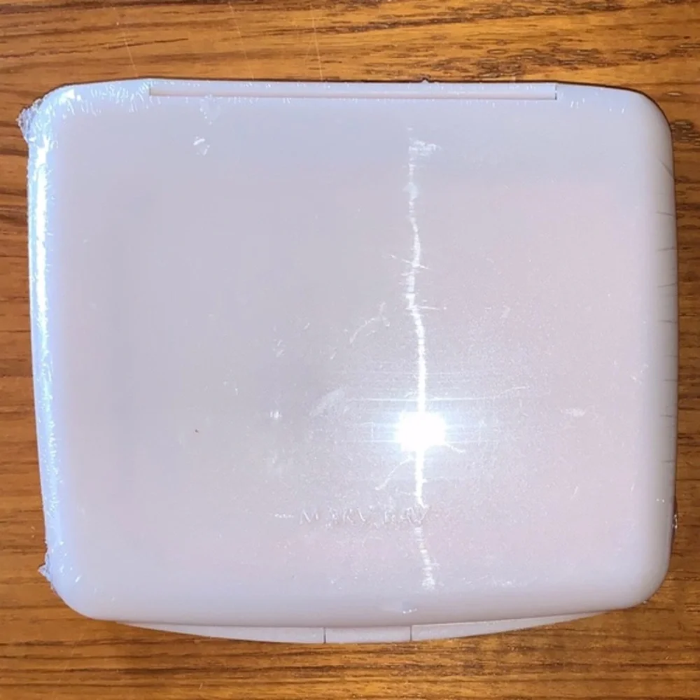 Mary Kay NWOT pink compact travel mirror. In original wrapping.