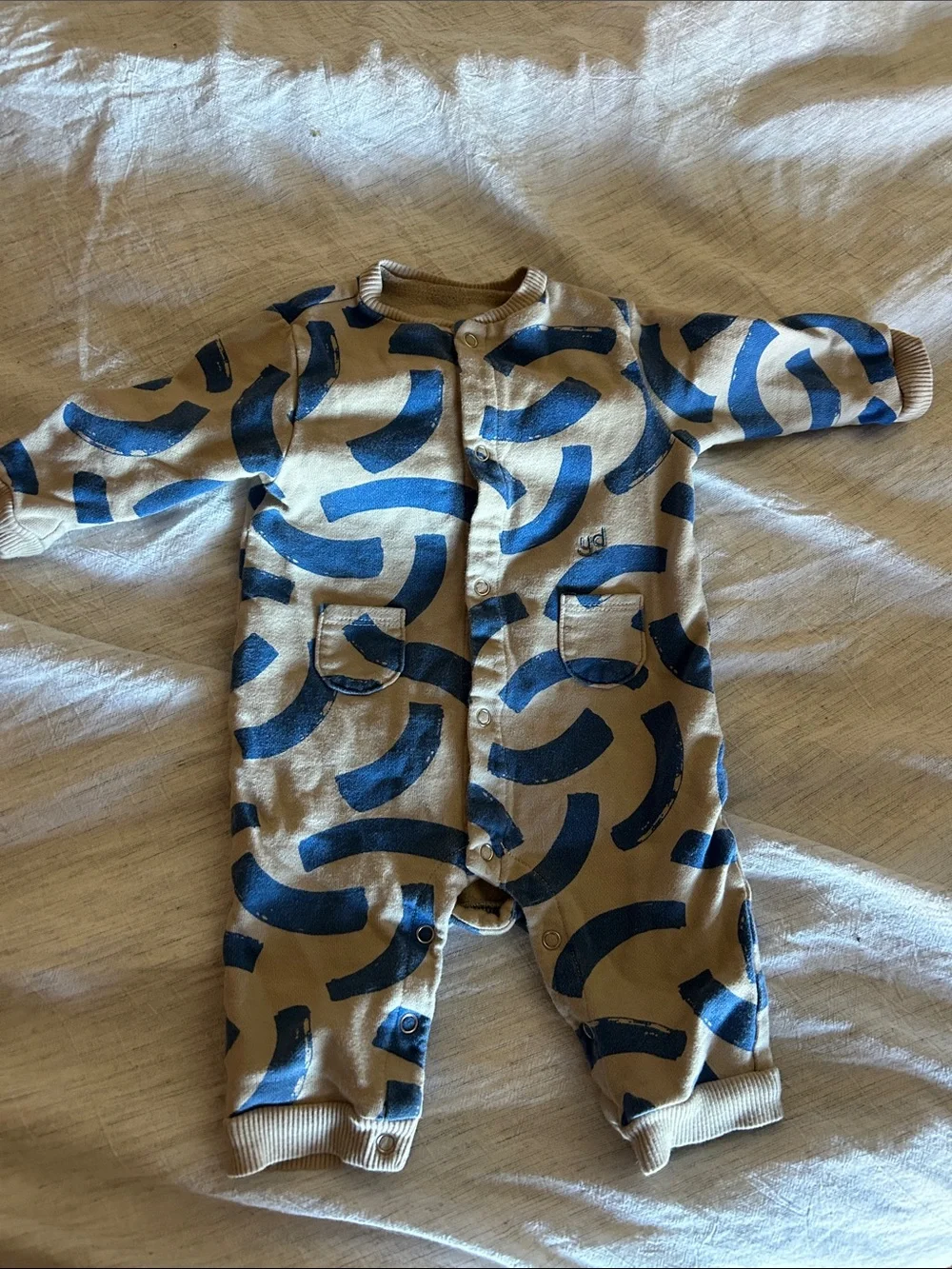 Young Days Beige Kids Footie with Navy Abstract Arcs
