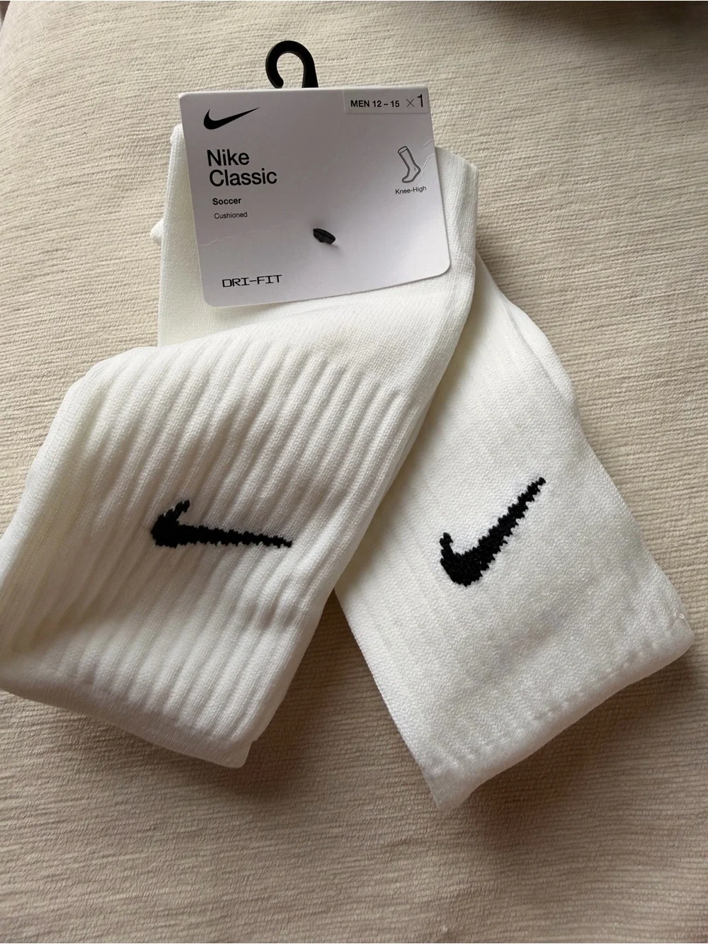 Nike White Knee-High Athletic Socks with Black Swoosh