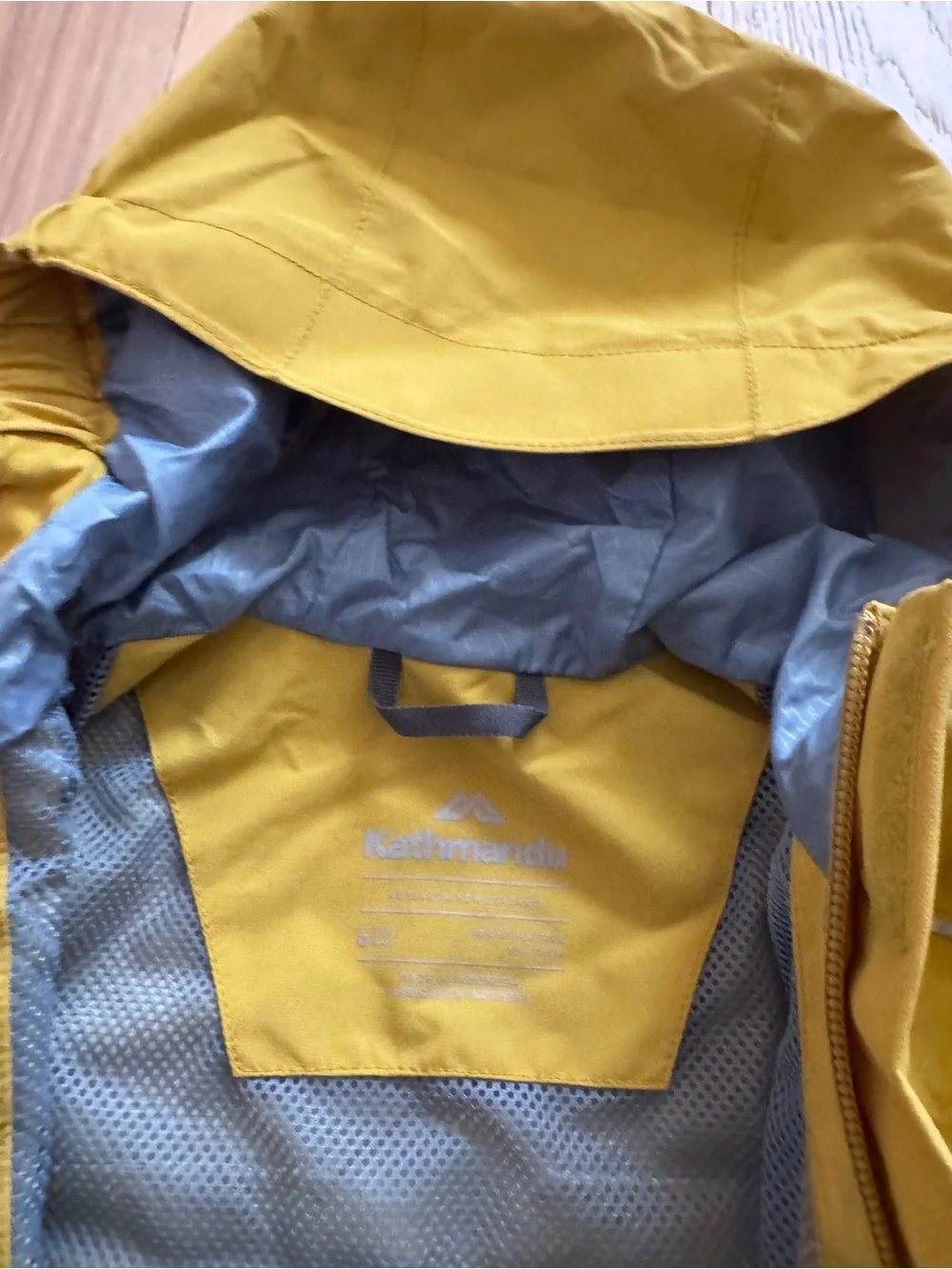 Kathmandu Kids Yellow Hooded Rain Jacket