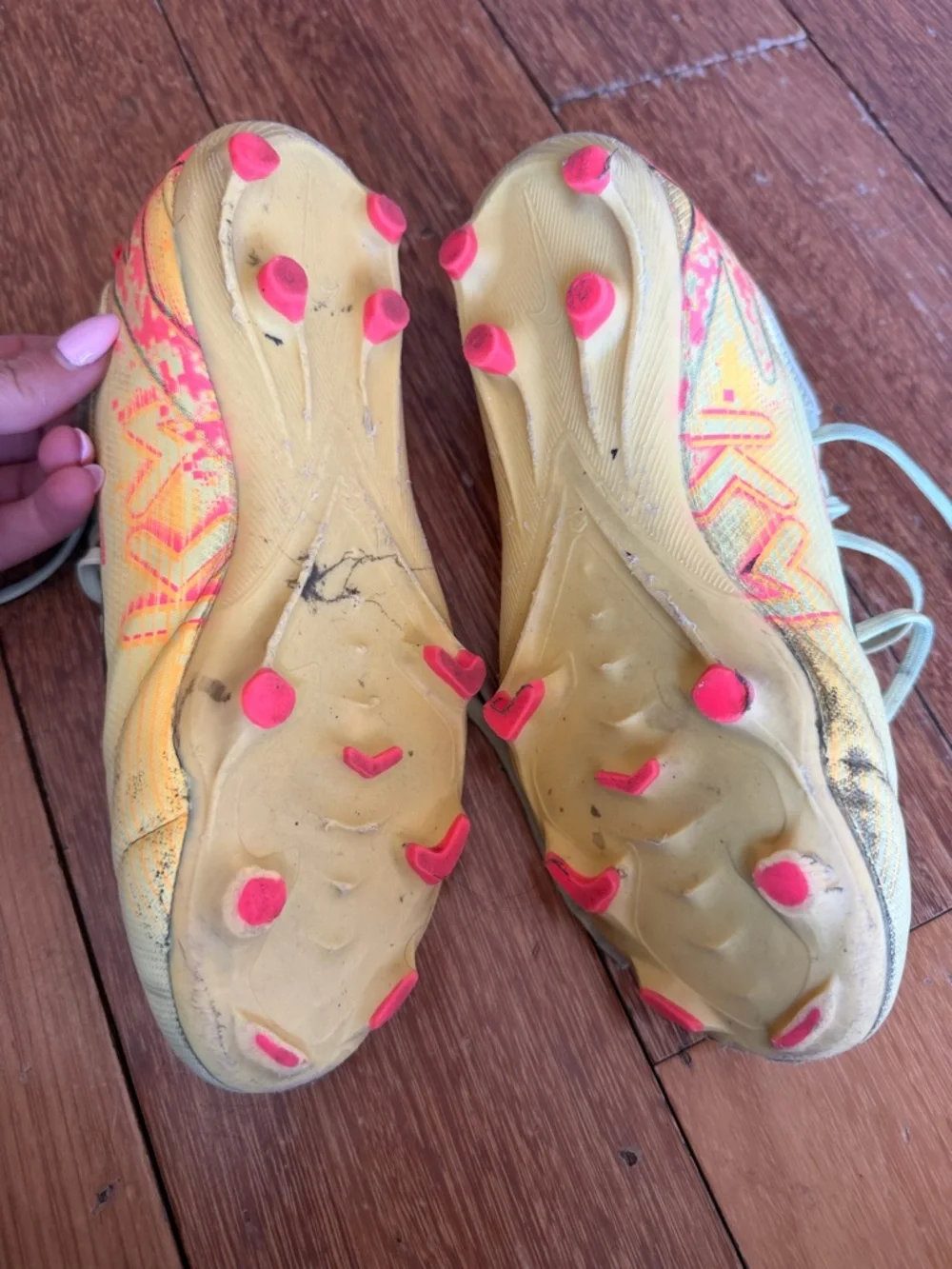 Nike Yellow Soccer Cleats with Black Swoosh and Accents