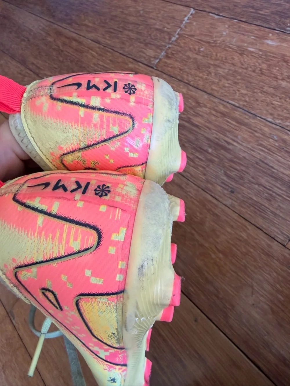 Nike Yellow Soccer Cleats with Black Swoosh and Accents