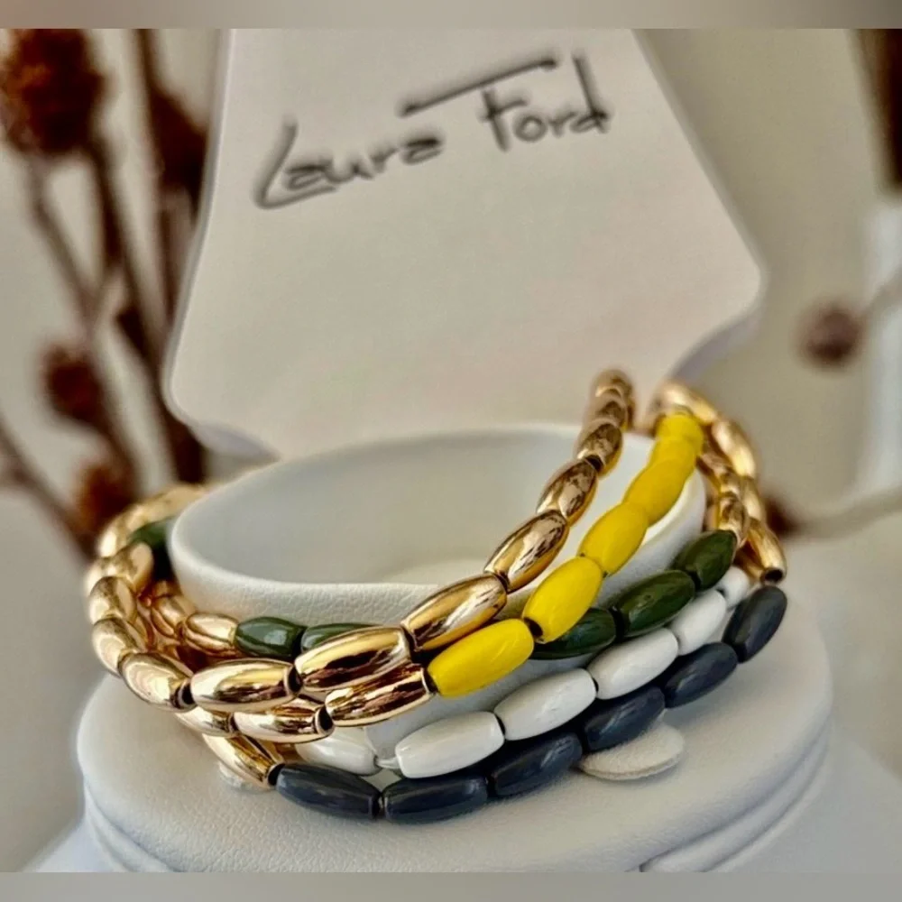 Laura Ford Goldtone 5 Row Rice bead yellow,green, blues & white,chunky stretch