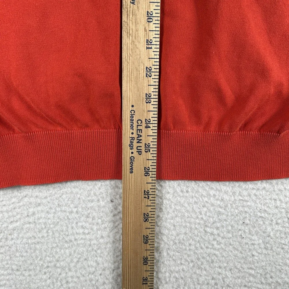 Lacoste sleeve knit shown