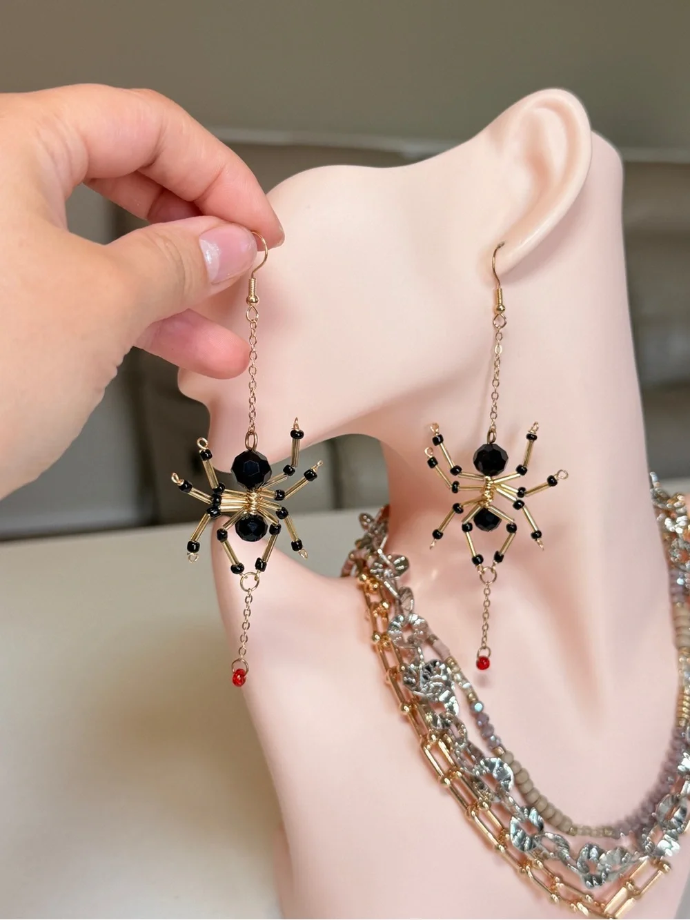 Gold and Black Beaded Spider Dangle Earrings
