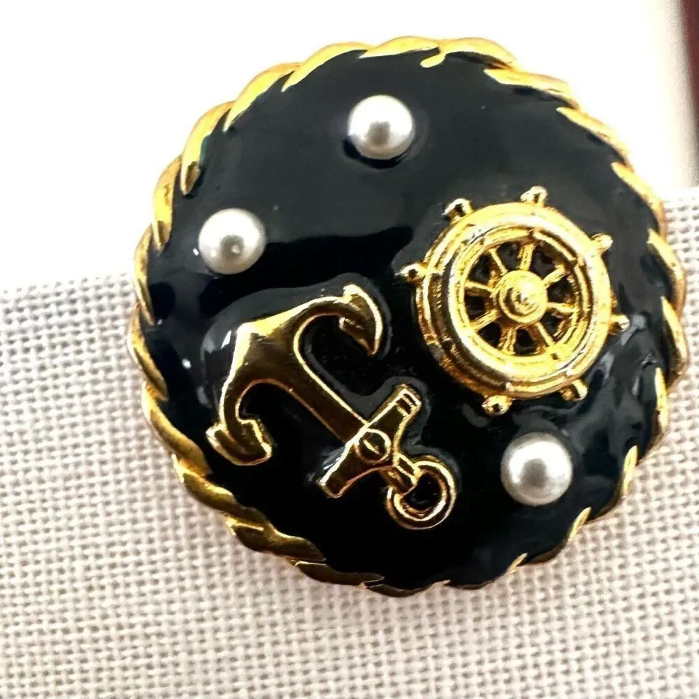 Navy round nautical clip earrings not stopping