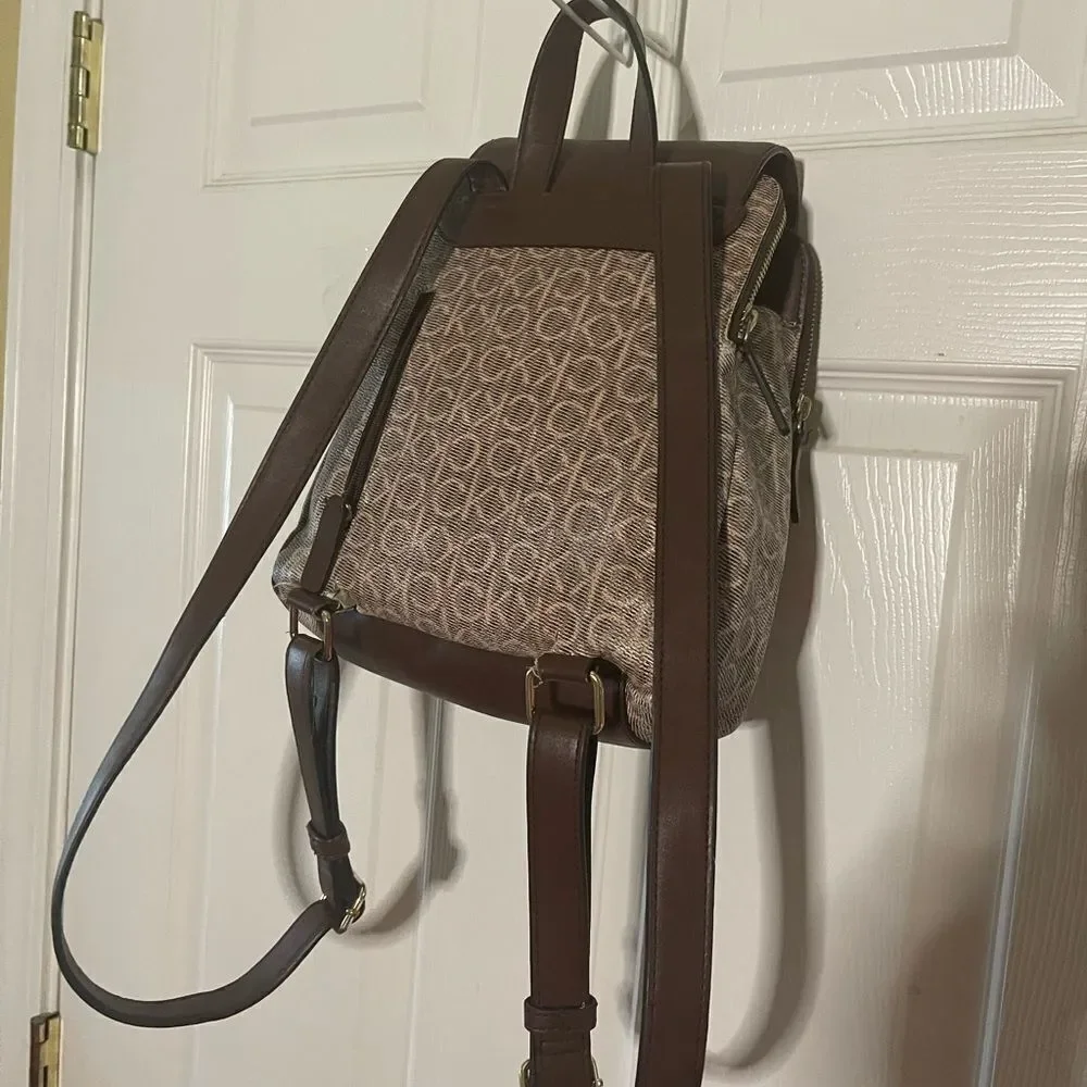 Calvin Klein Tan and Brown Logos  small Backpack logo tone hardwares.