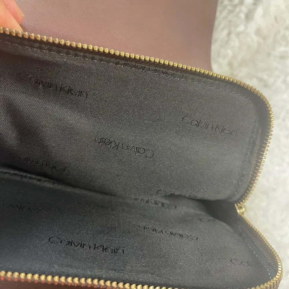 Calvin Klein Tan and Brown Logos  small Backpack logo tone hardwares.